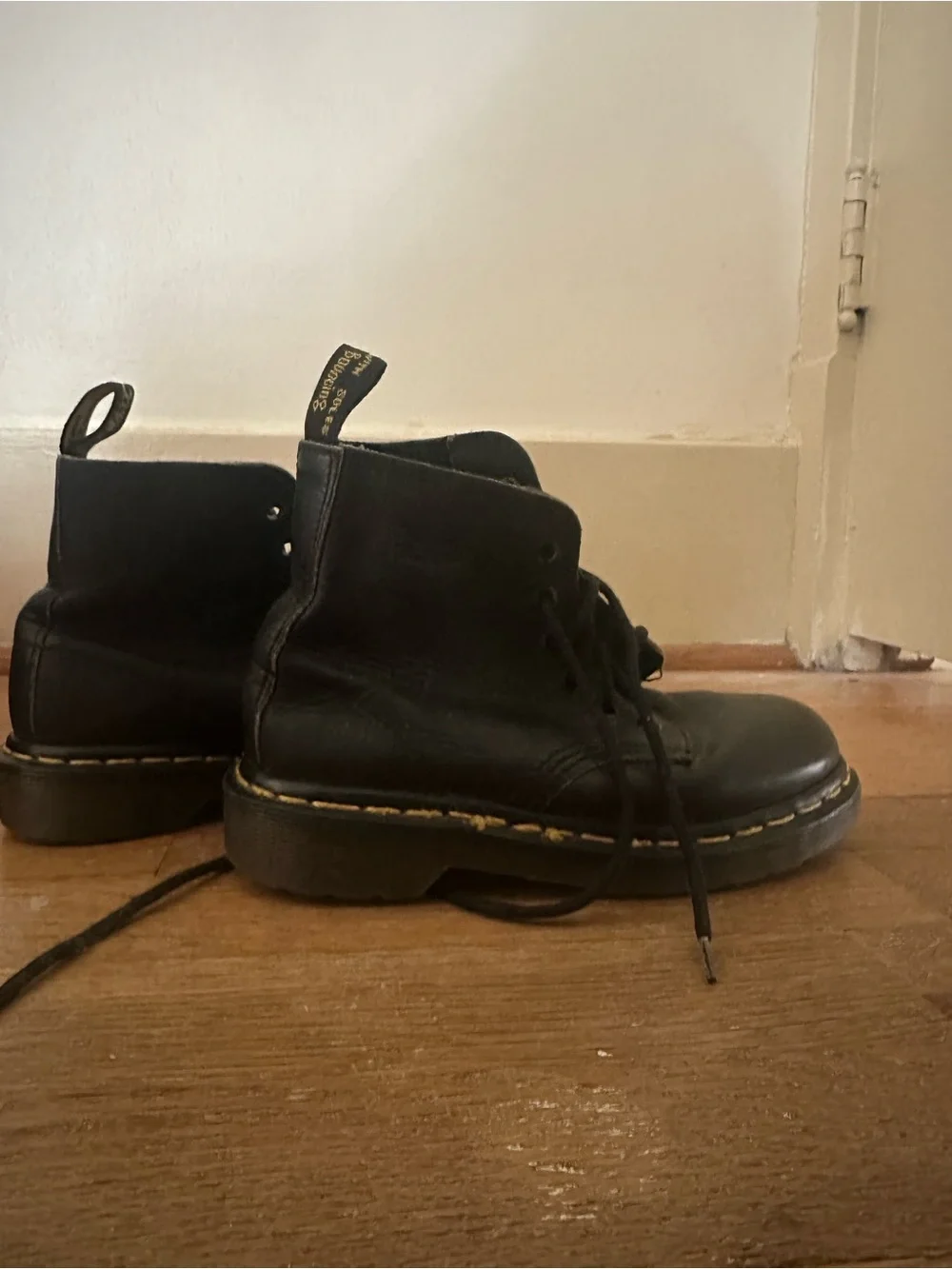 Dr. Martens Kids Black Lace-Up Leather Boots with Yellow Stitching